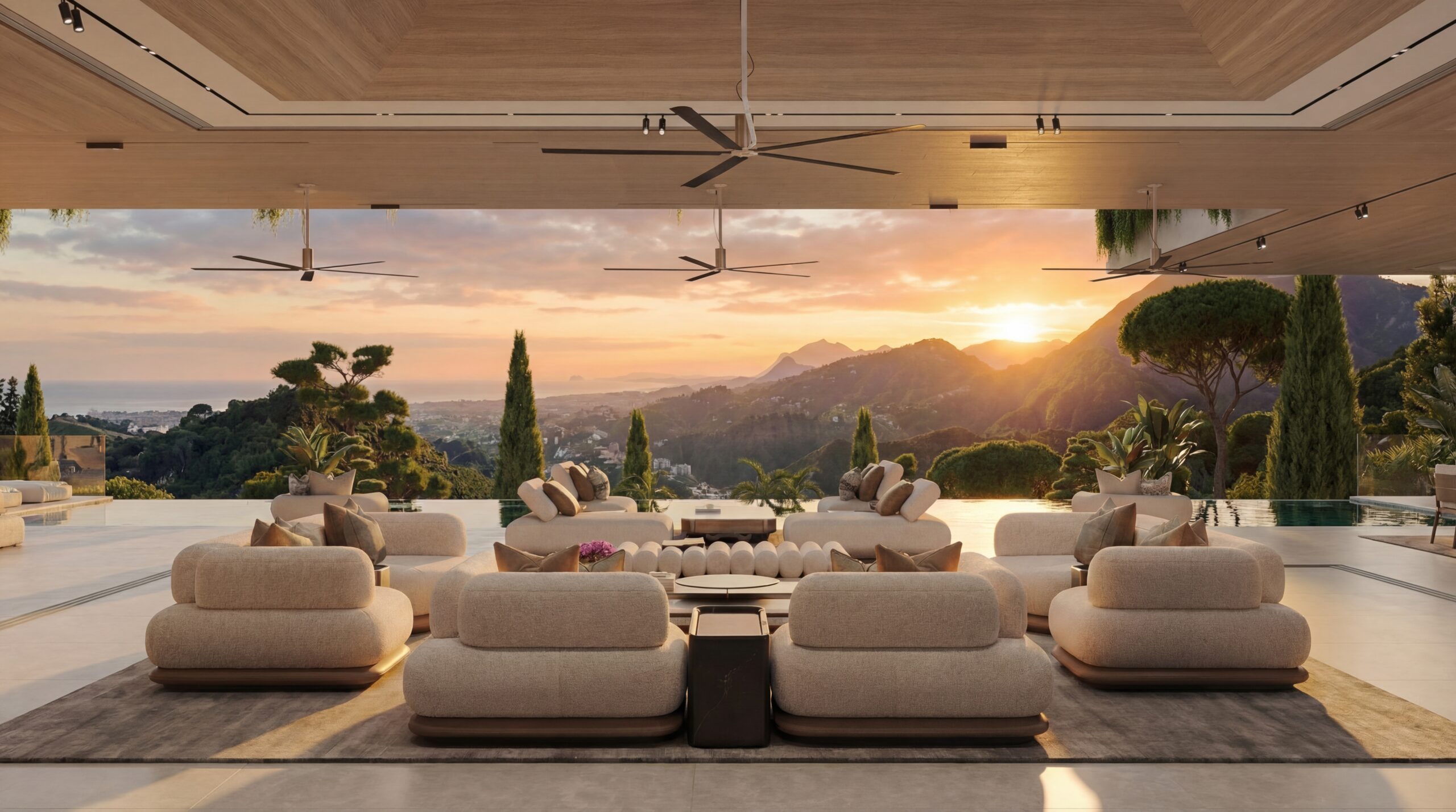 Luxury outdoor living area with infinity pool and panoramic mountain view designed by our architects in Marbella.
