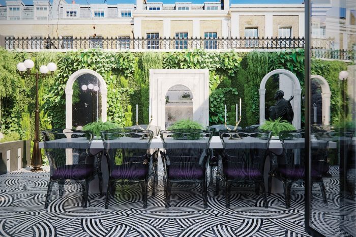 The Family Kitchen opens out onto a contemporary patio with its own vertical herb garden.