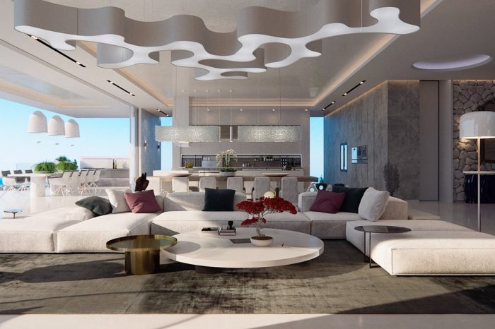 The bright and spacious living area with its giant ceiling sculpture, perfect for the size of the room.