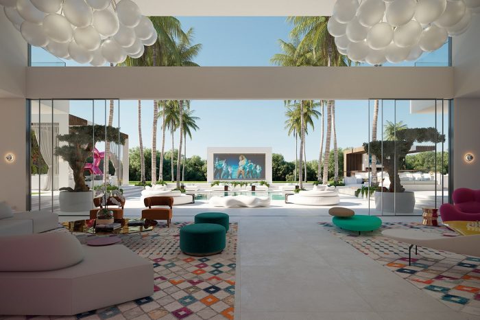 Impressive view: the main lounge area extends effortlessly into the villa’s own palm tree boulevard, with a giant LED screen at the end.