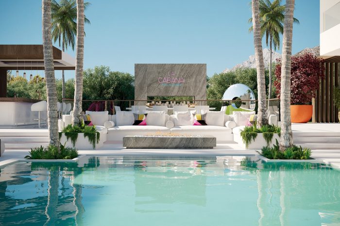 The pool area: the neon La Cabana sign may not be a geographical necessity, but true to the somewhat quirky design of the entire villa, it is an essential design element, as well as a reminder that entertaining is taken seriously in this house. The white sofas are custom-made by UDesign.