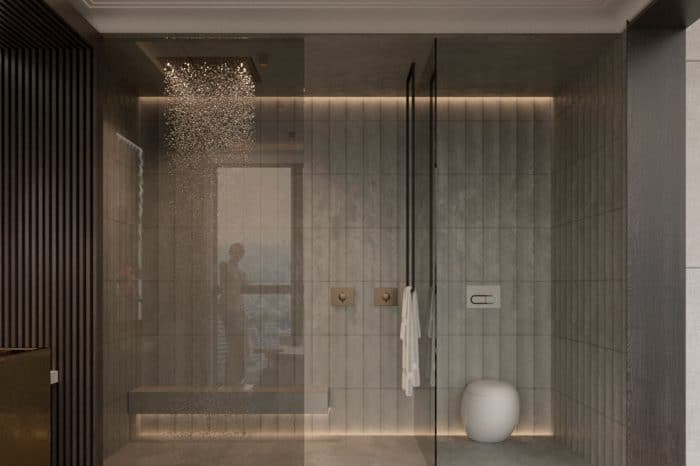 The shower area, opposite the bath, includes a practical bench seat