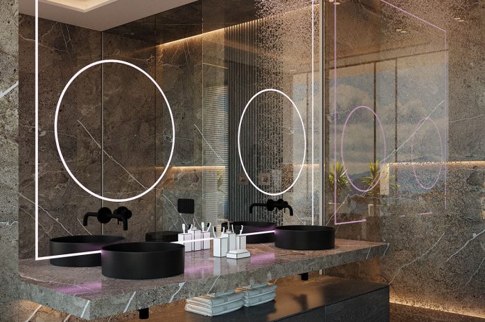 The master bathroom is made entirely of dark marble with inky wood and a touch of neon lighting, it gives an urban, art-smart feel to this intimate space.