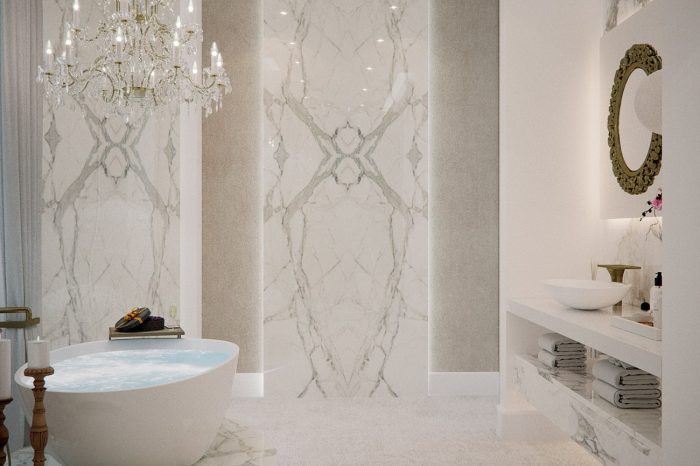 “Her” bathroom couldn’t be more feminine and elegant. Marble plinth for the bath matches the panels surrounding it