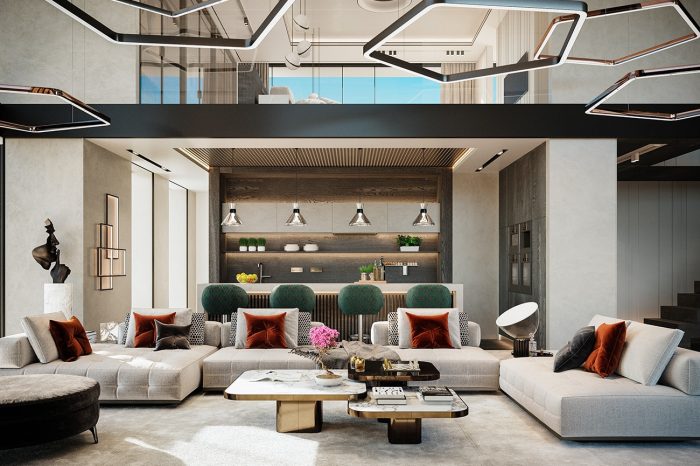 Lounge: Olive stools by Brabbu and rust-orange cushions add colour to an almost monochrome lounge. The overhead lighting is by Henge, the nest of coffee tables by Classicon.