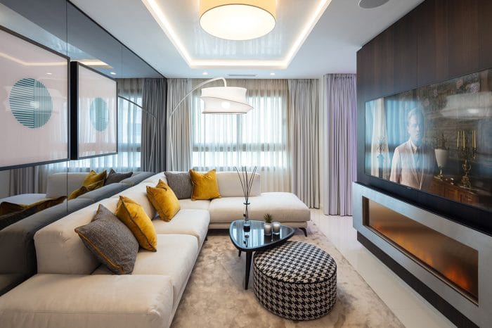 Lounge area of master suite with custom wall art.