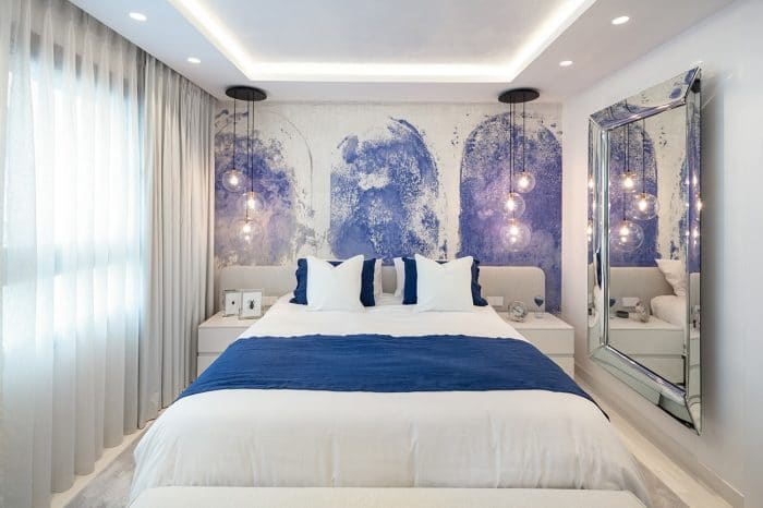 One of the guest bedrooms picking up the Moroccan flavour of the rest of the apartment.