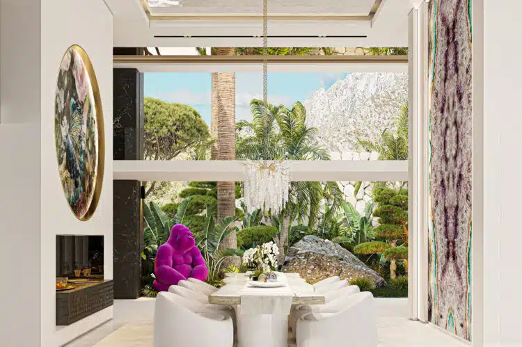 In the dining room he huge rock in the garden becomes an integral part of an overall muted design, the gorilla providing the splash of colour.