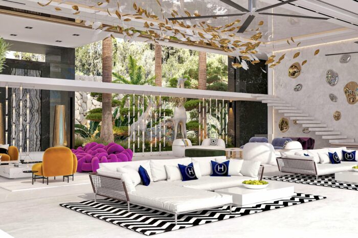 View across lounge showing interior garden and giraffe sculptures